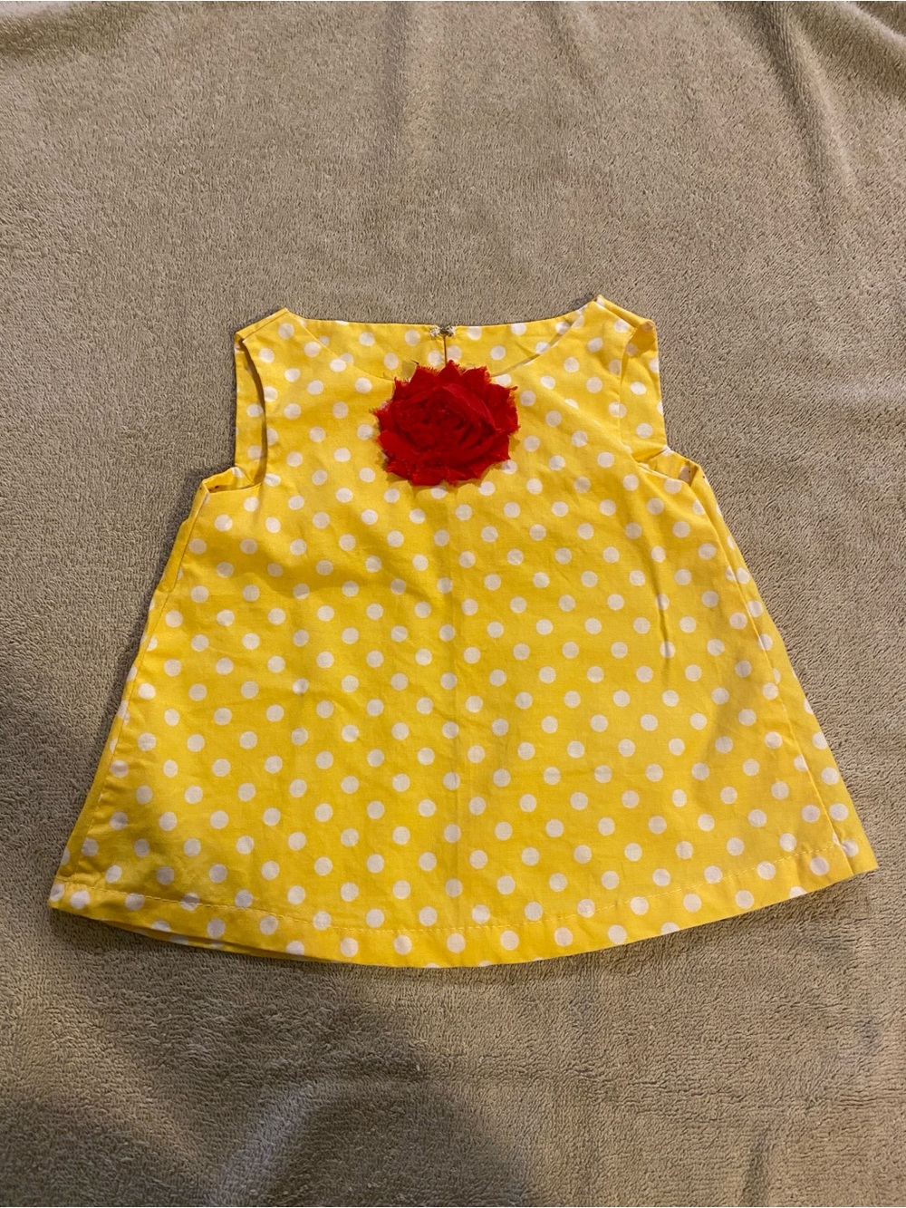Yellow Polka Dot Dress with Red Flower Accent